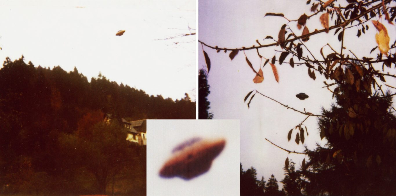 Fehrenbach 1994 - hochgeworfenes Spielzeug Deutlich erkennbare bräunlich erscheinende Untertasse mit violettem kuppelartigen Aufbau am Himmel.